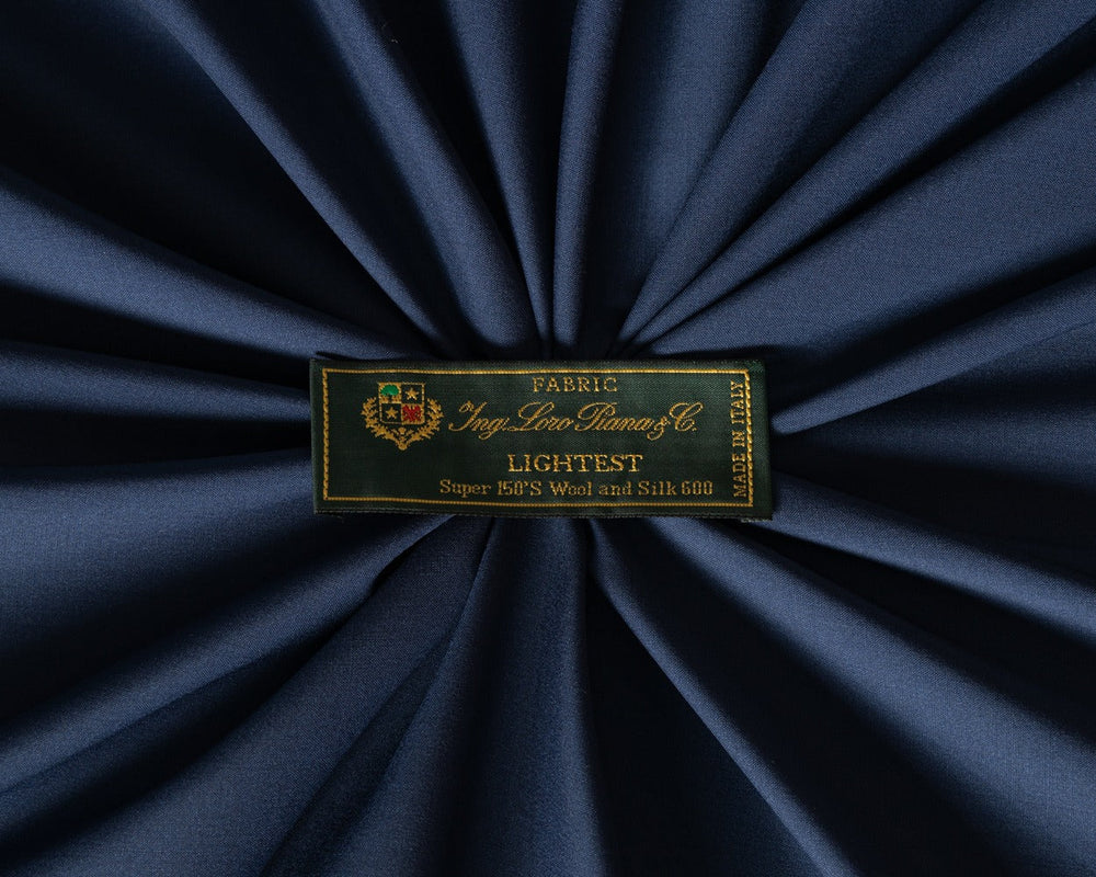 Loro Piana blue wool and silk fabric with woven brand label