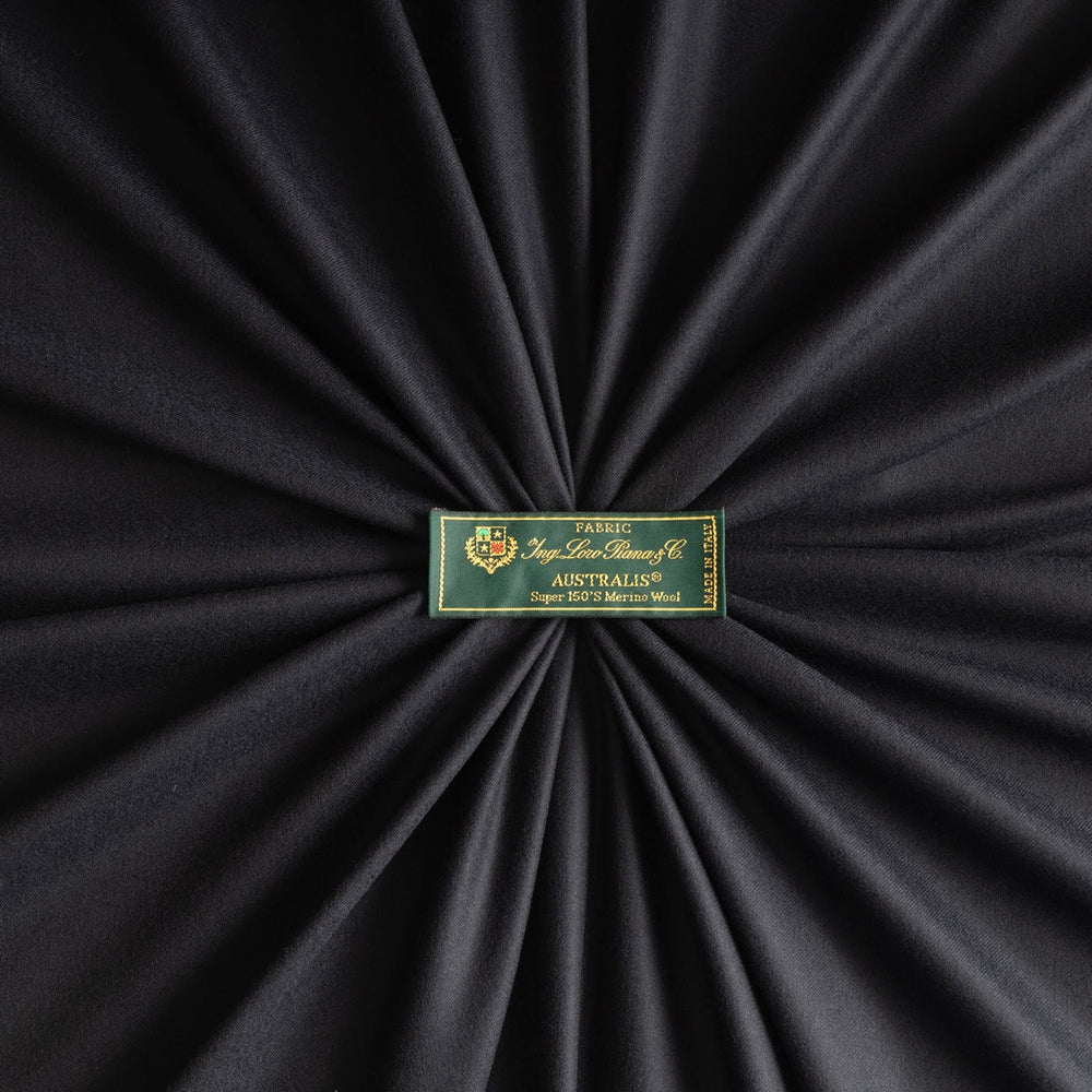 Loro Piana dark wool fabric with woven brand label