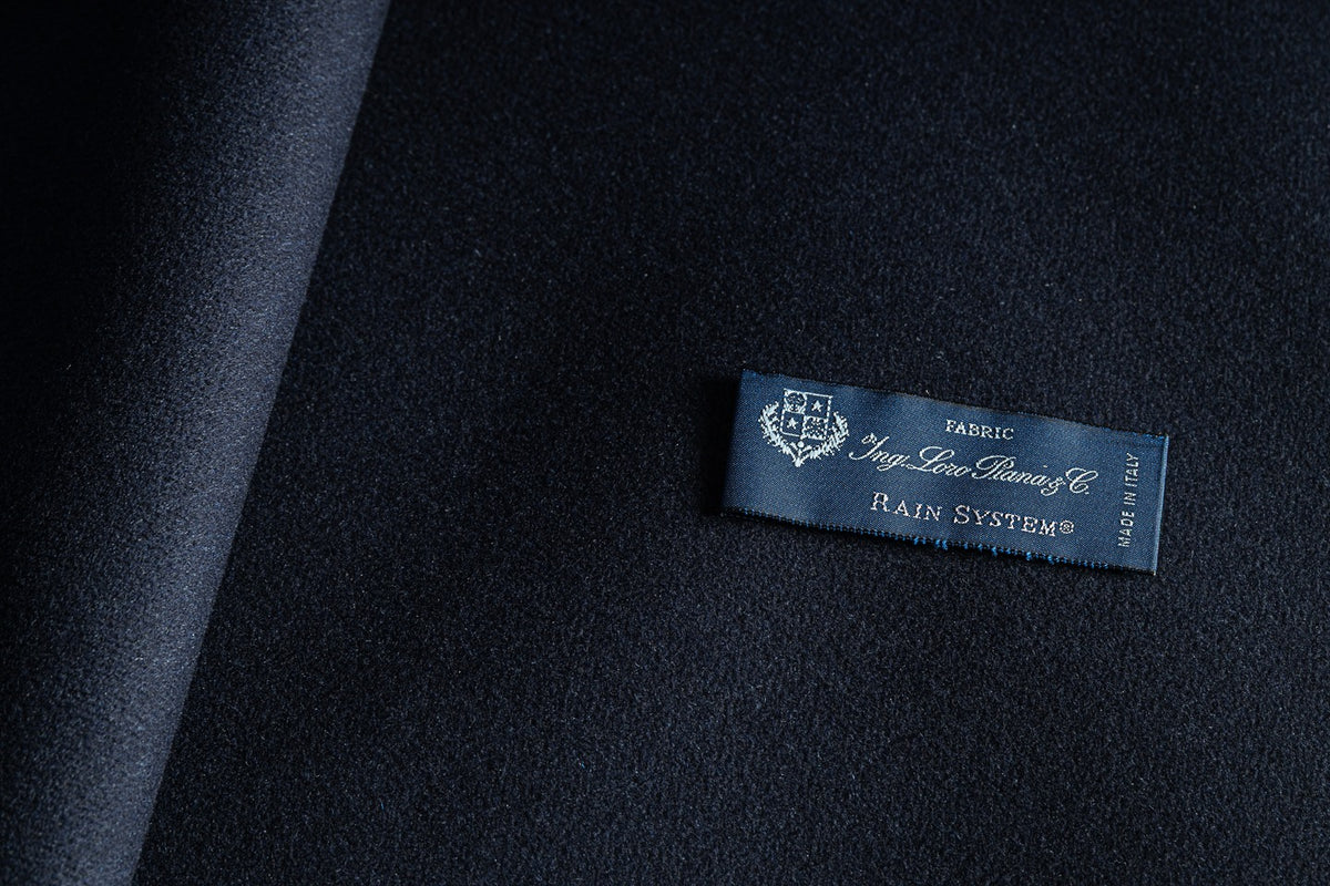 Loro Piana navy cashmere with Rain System brand label